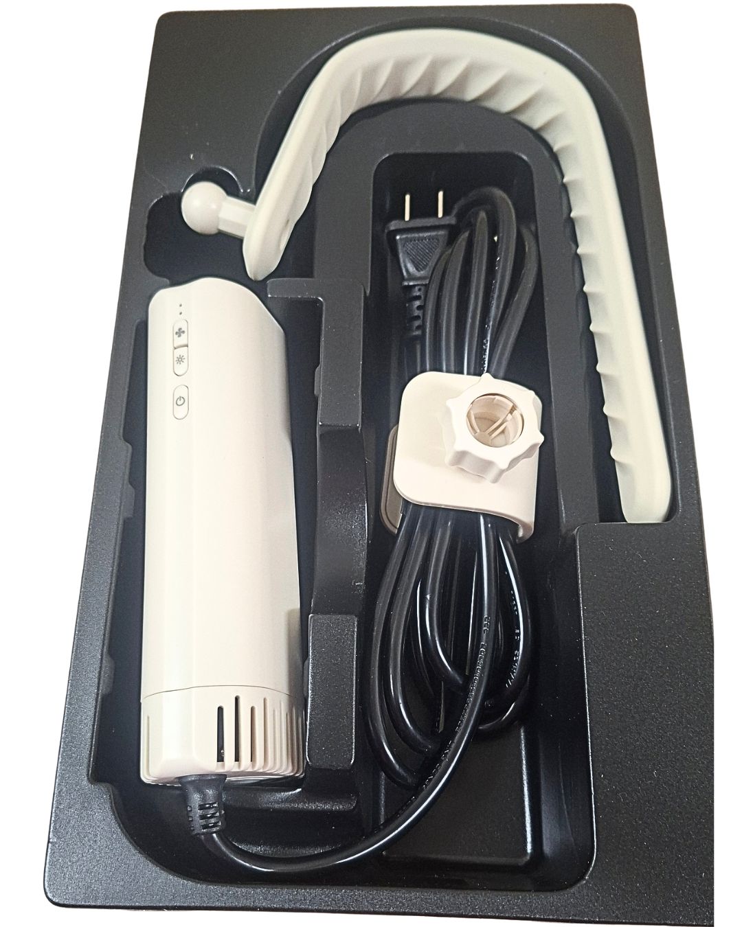 beige neck dryer in blck tray